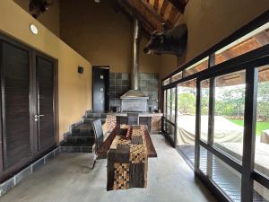 a room with a table and a stove in a room at Castle View in Pretoria