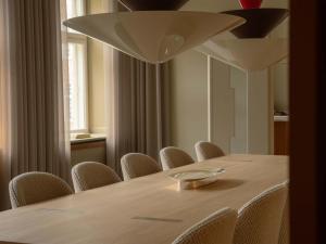 a conference room with a table and chairs at Four Suites Copenhagen - Boutique Townhouse Suites in Copenhagen