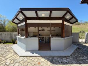 a large building with a lot of windows at Vila Sana in Landeke +8 photos