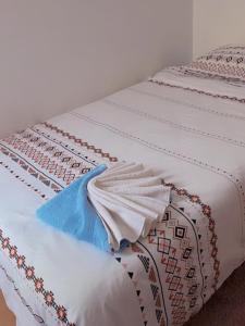 two twin beds sitting next to each other at Habitación Ático Sol y Mar in Rincón de la Victoria