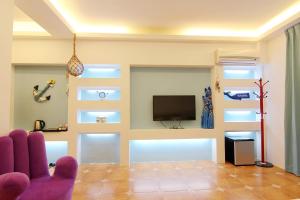 TV o dispositivi per l'intrattenimento presso Zi Jìng Fang Inn