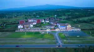 an aerial view of a large house on a hill at Kinyuki Country Hotel in Nanyuki