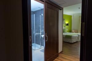 Postel nebo postele na pokoji v ubytování Palacio Valderrabanos