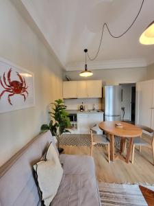 a living room with a couch and a table at Hotel Celta in Vigo