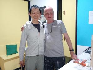 two men standing next to each other in a room at SEVILLE YOUR WAY in Seville