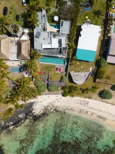 an aerial view of a house and a pool at Villa Arty by muse villas in Poste Lafayette +31 photos