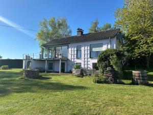 a large white house with a large yard at HeartArt in Bad Münstereifel