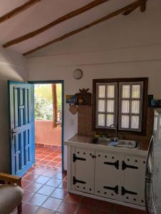 a kitchen with a sink and a counter top at Casa Brisa Marina El Yaque in El Yaque +9 photos