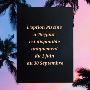 a black sign with palm trees in the background at The White Home Broadway Love Room in Châteauroux +23 photos