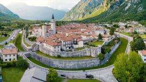 an aerial view of a town in the mountains at Affittacamere Agli Ulivi in Gemona del Friuli
