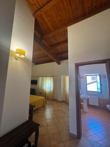 a view of a room with a bedroom at La terrazza del cilento in Perito