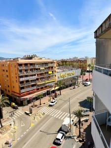 an aerial view of a city street with buildings at Apartments Lloret Sun in Lloret de Mar