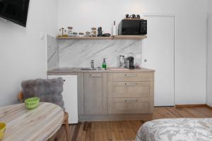 Cuina o zona de cuina de Chambre - Vue sur Alignements