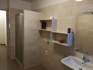 Koupelna v ubytování Melibi - Re Lear Apartments