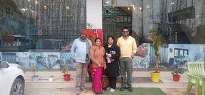 a group of people standing in front of a store at Village guesthouse in Srinagar