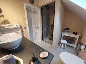 a bathroom with a sink and a toilet at Ferienwohnungen Naheliebe in Bärenbach +64 photos
