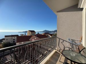 a balcony with a view of the ocean at Przno Sea Pearl - Seaview Holiday apartment in Pržno