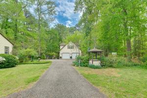 a driveway leading to a house with a gazebo at Pool Access! Cozy Couple's Getaway in Kilmarnock in Kilmarnock