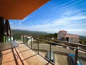 a view from the balcony of a house at Alcossebre Panorama Suite, Piscina y Terraza con Vistas in Alcossebre