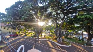 a view of a street with trees and a road at Studio Matriz 1 e 2 in São Sebastião