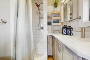 a bathroom with a sink and a shower at R&R Acres in Aransas Pass +27 photos