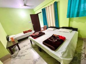 Katil atau katil-katil dalam bilik di Hotel Vijay Lok +20 gambar