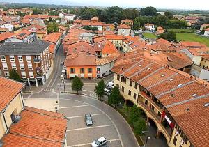 an aerial view of a city with red roofs at La Corte Guesthouse appartamento indipendente con giardino privato in Cornate dʼAdda