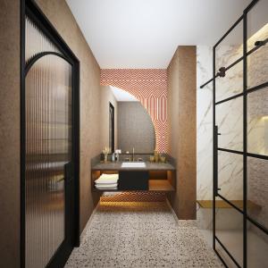 a bathroom with a sink and a mirror at The Berkeley Richmond, Outset Collection by Hilton in Richmond