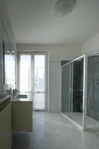 a large bathroom with a shower and a sink at Villa La Corte in Cesa +42 photos