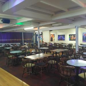 an empty room with tables and chairs in it at Dawlish Warren Welcome Family Holiday Park Villa Clover Welcome2Warren South Devon in Dawlish Warren