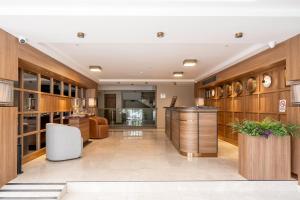a lobby with a bar and a dining area at The Marni Hotel & Spa - Adults Only 12 Plus in Antalya +228 photos