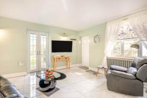 a living room with a couch and a tv at 1 Bed in Beccles oc-65080 in Beccles