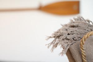 a close up of a basket with a rope at Strandhaferweg 7 Beach Apartment Fehmarn in Burgtiefe auf Fehmarn  +14 photos