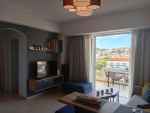 a living room with a view of a living room at Skala Central Comfort Apartment in Skála