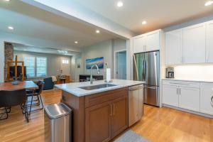 a kitchen with a sink and a counter top at Lake Walk Cottage in Black Mountain