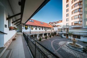 a view from a balcony of a building with a fountain at Apartmány Reduta - new in Lučenec