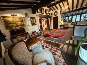 a living room with a couch and a table at Hotel Santillana in Santillana del Mar