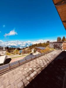 a view from the roof of the building at studio le Bouquetin 304 in Chamrousse