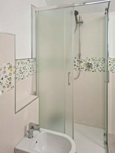 a bathroom with a shower and a sink at Casa Vacanze Il Conte in Valfabbrica +35 photos