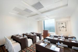 a large dining room with tables and chairs at Grand Fiesta Americana Chapultepec in Mexico City +114 photos