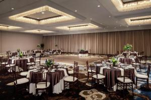 a banquet hall with tables and chairs in a room at DoubleTree by Hilton Manchester Downtown in Manchester +46 photos