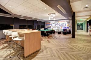 a conference room with a pool table and billiards at Tru By Hilton Raleigh Durham Airport in Morrisville