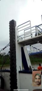 a stack of tires on the side of a boat at Praia dos sonhos 123 in Diadema