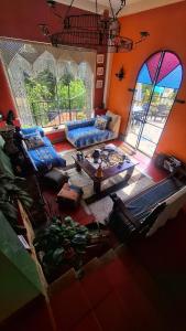 an overhead view of a living room with couches and a table at El Pedregal Sopó in Sopó