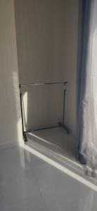 a empty bed in a room with a window at Ocean and Mountain View T2 N-3 in Lazareto
