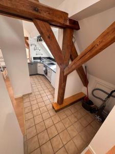 an overhead view of a kitchen with wooden beams at Bavaria Home Kitchen Parks No 5 in Geisenfeld