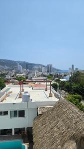 a view from the roof of a building at Comfortable apartment with pool, close to the beach in Acapulco