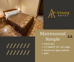 a hotel room with a bed and a sign that saysyrinth simple at Atong Hotel in Chancay