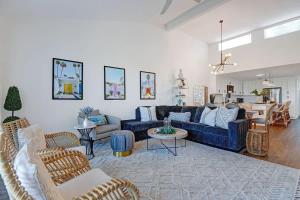 a living room with a blue couch and chairs at Courtyard-Patio-Moutain and V3872-Holly House in Palm Desert +28 photos