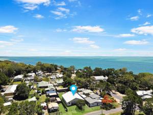 an aerial view of a suburb with a blue marker at Amity Duo - Roys in Amity Point